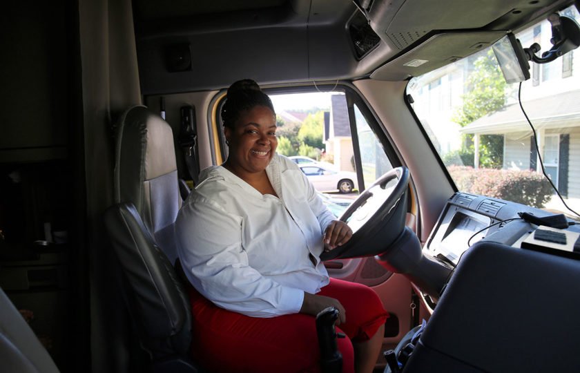 32-year-old Q. Johnson behind the wheel of her truck