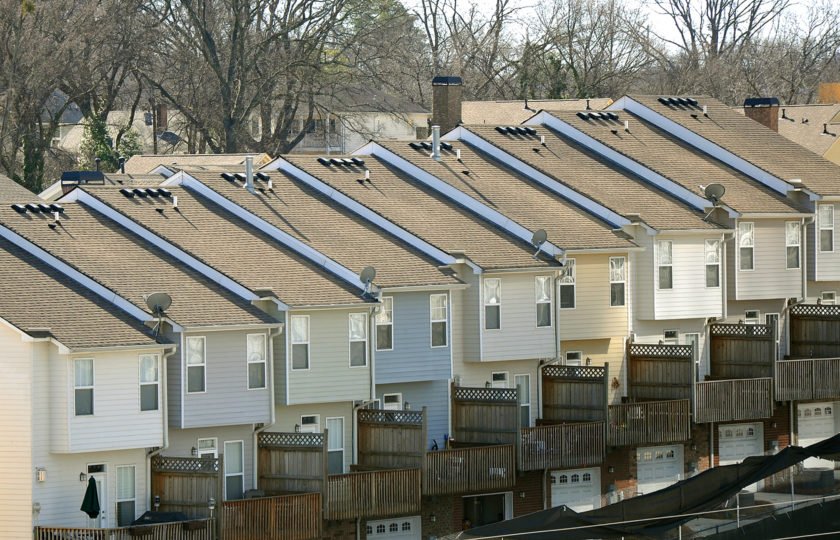 Townhomes lined up with back porch