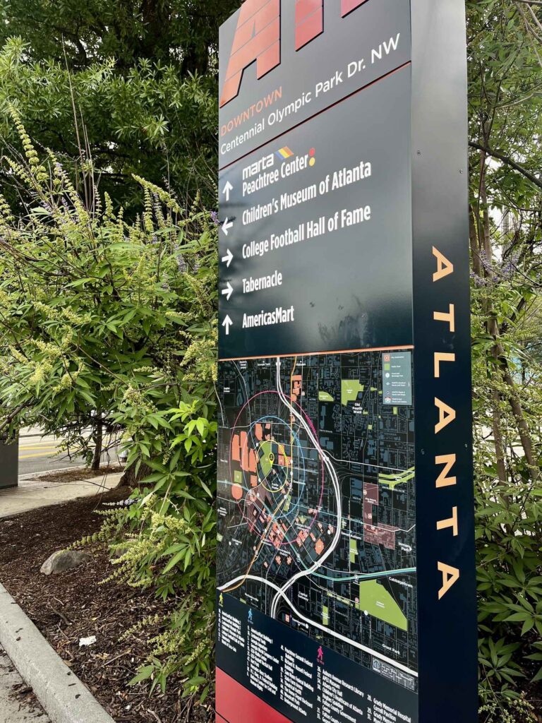 Wayfinding signage in downtown Atlanta directs people to nearby MARTA stations, museums and attractions.