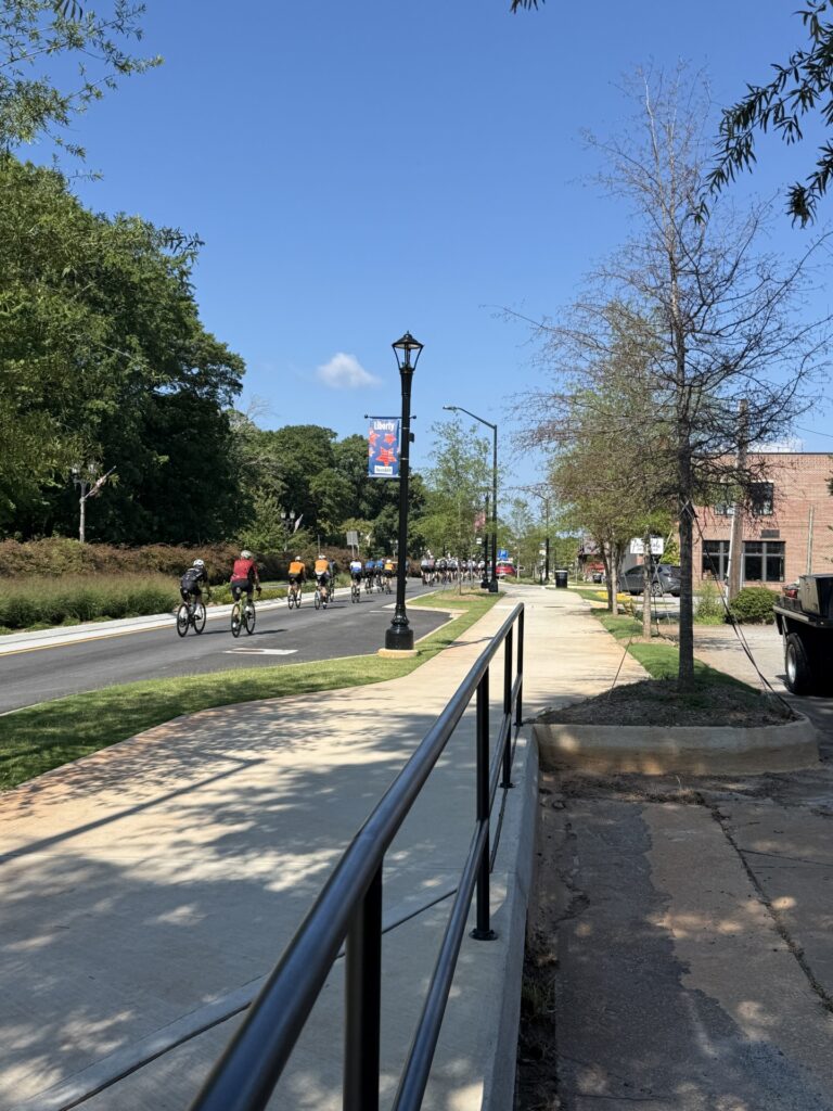 Avondale Estates transformed its main downtown thoroughfare into a complete street with fewer lanes, wide sidewalks, and a 10-foot multi-use path.