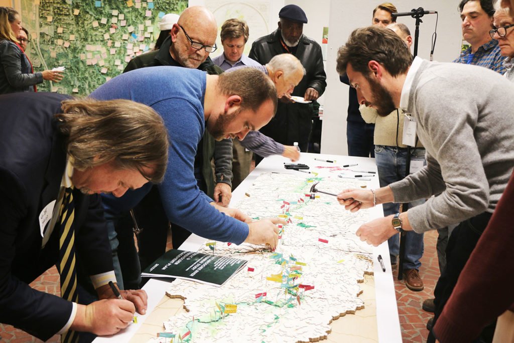 A group of participants identify key areas of the river during the Chattahoochee River Study meeting.