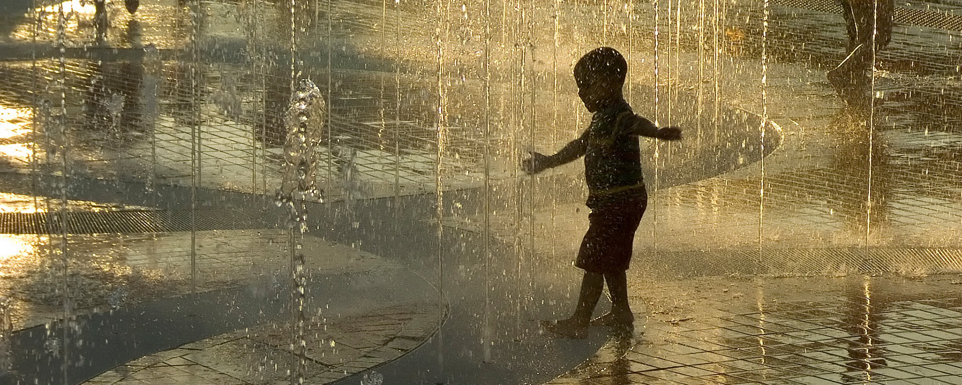 Child playing at water park