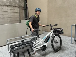 Johann Weber standing next to his bike