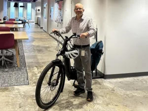 Paul Donsky standing next to his bike