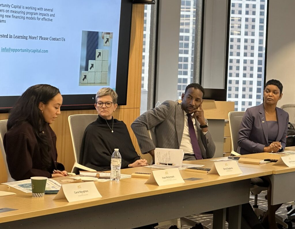 Image of Anna Roach and ARC Chair Andre Dickens at a regional conversation around economic mobility