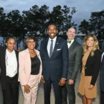 RLI members posing with Mayor Andre Dickens