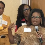 RLI member speaking into a microphone